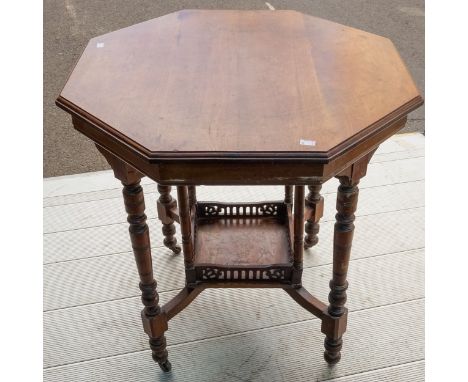 An early 20th Century mahogany occasional table, on turned supports with central tier shelf section, approx 74cm high x 75cm 