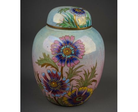 An early 20th Century Carlton Ware lustre ginger jar and cover, decorated with daisies on pale blue ground, gilt heighted, fa