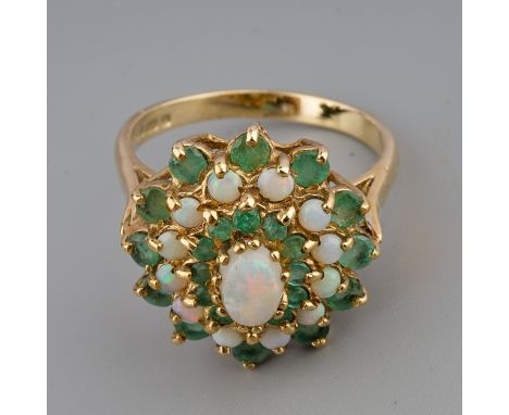 A 9ct yellow gold opal and emerald oval cluster ring, size Q, gross weight approx 4.7g 