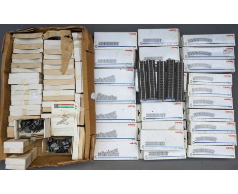A large quantity of boxed Marklin tracks straights, curves, points plus other makes track parts, 2 boxes 