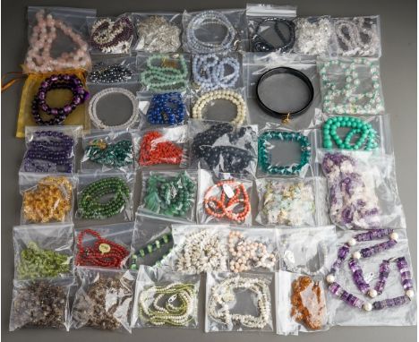 Assorted gem-set necklaces and bracelets, including amethyst, rock crystal, aventurine, jade, haematite, opal, pearls, amber,