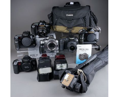 A collection of Canon Cameras to include a Canon EOS 20D camera with a 18-55mm EF-S f5-5.6, a Canon EOS 5 camera body, a Cano