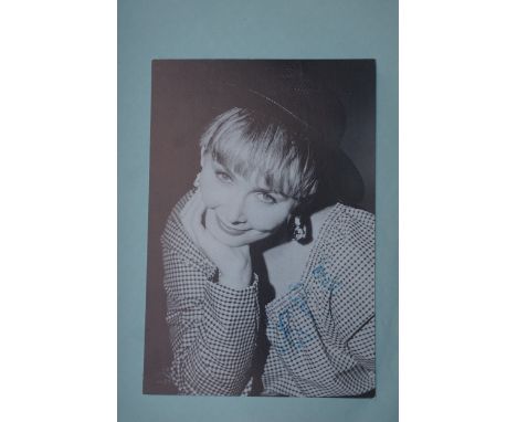 Autographs, a folder containing over eighty signed publicity photos, letters, magazines or scraps of paper signed by music ar