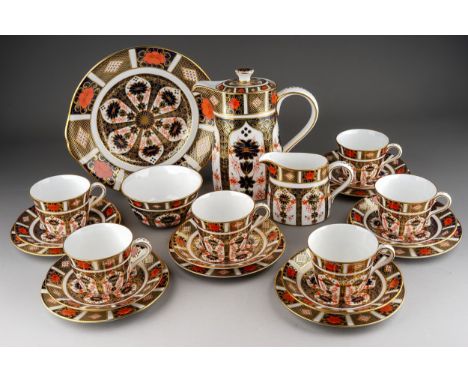 A Royal Crown Derby Imari 1128 pattern twenty two piece tea set, comprising hot water jug and cover, milk jug, open sugar bow