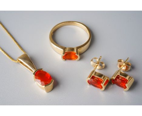 A suite of 14k yellow gold and fire opal, including a ring, size N, a pendant necklace, and a pair of stud earrings, total co