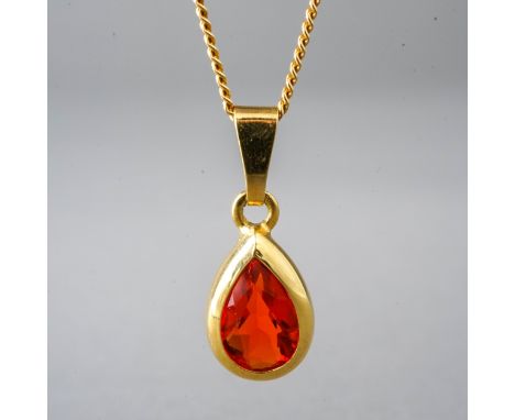 An 18ct yellow gold and fire opal pendant, on a fine chain, total gross weight approx 3g 