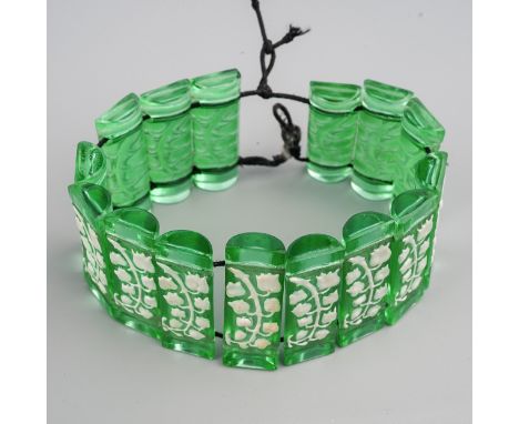 Lalique green glass ( glows as uranium glass under UV 365 light) and white enamelled sectional bracelet, comprised of fifteen