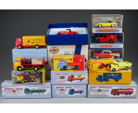 A box of Atlas Edition and Matchbox reproduction Dinky vehicles, all boxed, some still shrink wrapped, models include 905 Fod