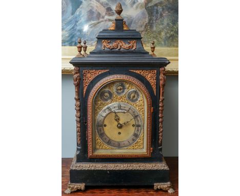 A late 19th century Howell &amp; James ebonised and gilt metal bracket clock, eight day movement, caddy top mounted with pine