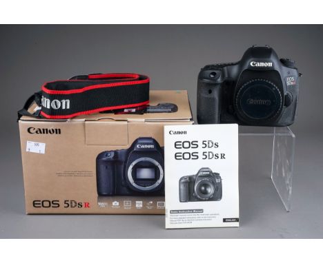 A Canon EOS 5DsR camera body with original box
