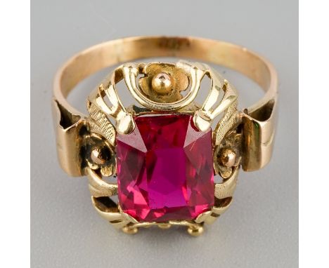 A yellow gold and synthetic ruby ring, size M, unmarked assessed as approx 14k, gross weight 3.1g 