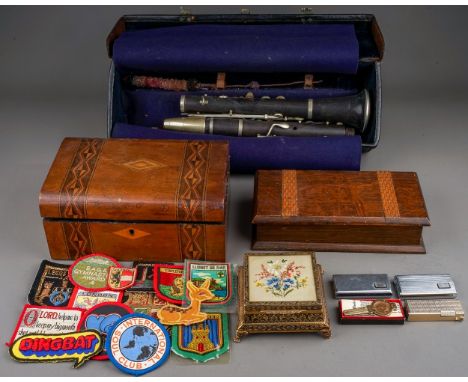 A cased Hawkes &amp; Son Excelsior Class clarinet, a small quantity of cloth badges including 'The Referees Association' and 