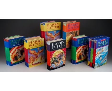 J. K Rowling, Nine Harry Potter hardback books, comprising the first three books (Philosophers Stone, Chamber of Secrets and 