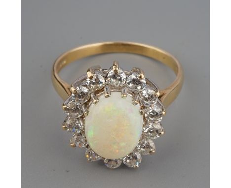 A 9ct yellow gold opal and CZ oval cluster ring, size Q, gross weight approx 3.5g 