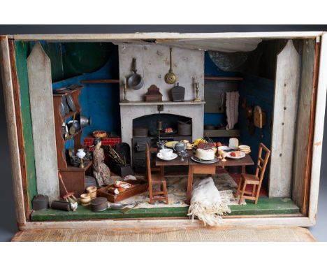 A rare 19th Folk Art dolls diorama of a kitchen, complete with full interior and accessories, includes a 13cm high peg doll i