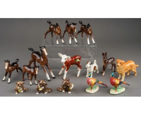 A collection of thirteen small Beswick animals, including Hereford calf 901b, Bush Baby with mirror and two other Bush Babies