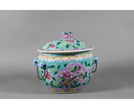 A late 19th or early 20th century Straits Chinese jar and cover, kamcheng, painted in famille rose enamels with phoenix and f
