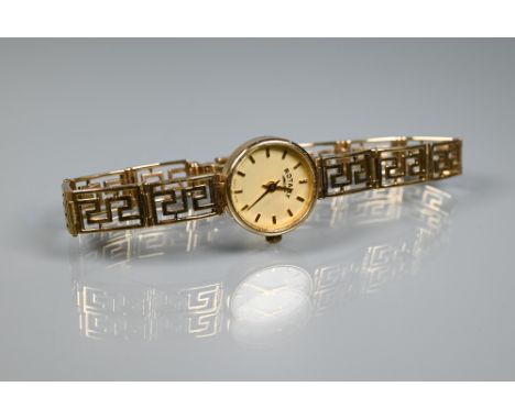 A 9ct gold Rotary watch on Greek key style bracelet strap 