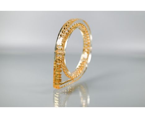 Chanel - A vintage lucite/plexi shaped bangle/bracelet with embedded Chanel motifs - chain and CHANEL a/f three joins/breaks 