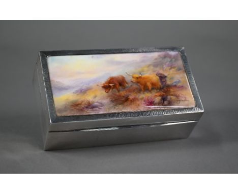 A silver cigarette box, the engine-turned cover inset with a ceramic plaque painted with Highland cattle by Royal Worcester a