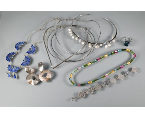 Longmire - a cylindrical multi-coloured tourmaline necklace, cased; five various white metal stamped 925 torques, two set wit