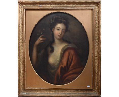 An 18th century portrait of a young lady holding a white flower, oil on canvas, 79 x 66 cm&nbsp; frame a/f 