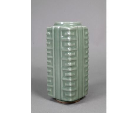 A Chinese Longquan celadon archaistic Cong form vase in the Song dynasty manner, covered overall in an even mid-green glaze, 
