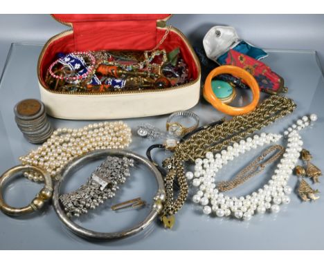 A collection of vintage and other jewellery including gilt metal chains, simulated pearls, two wristwatches, Thaler on chain,