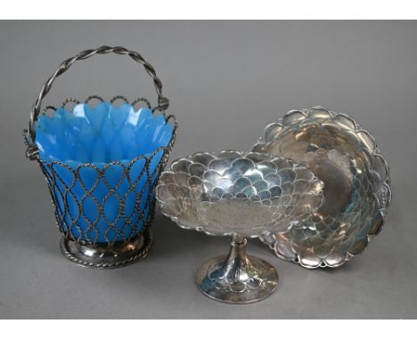 A Victorian silver twisted wire sugar basket with swing handle and frosted blue glass liner, Elkington &amp; Co., Birmingham 