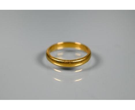 A 22ct yellow gold wedding band, size R, approx 4.5g 