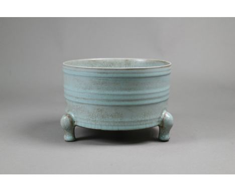 A Chinese Ru style tripod censer or incense burner in the Song dynasty manner, duck-egg blue finely crackled glaze and decora