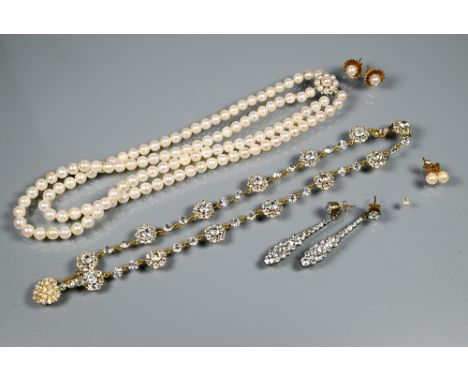 A vintage necklace formed of alternate white paste clusters and single pastes, closed back settings stamped silver, a pair of