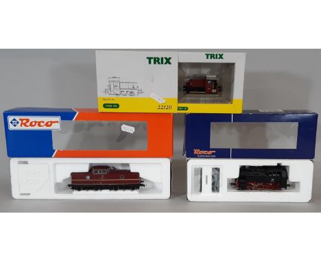 Three boxed HO gauge model locomotives including Roco Class 280 diesel 63382, Roco steam locomotive 0-6-0 63289, and a Class 