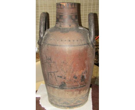 An old terracotta bottle neck vase with moulded loop handles and hand painted detail of an artist with working portrait on ea