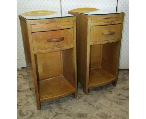A pair of art deco pale oak bedside or lamp tables with slides and drawers 