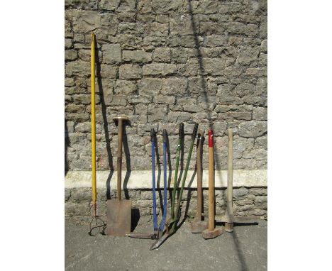 A small collection of vintage and later long handled mainly garden related tools 