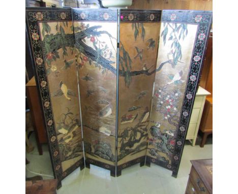 Eastern lacquered four fold floor standing screen with decorative bird detail within a repeating floral border, 183cm H, each