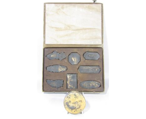 A 19th century Japanese bronze with rub gilt finish, circular box with geese amongst flowers to the lid, together with a set 