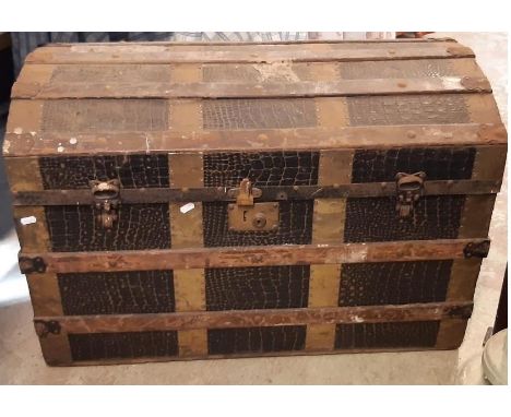 A vintage timber lathe bound domed top travelling trunk with simulated crocodile finish, (af) 