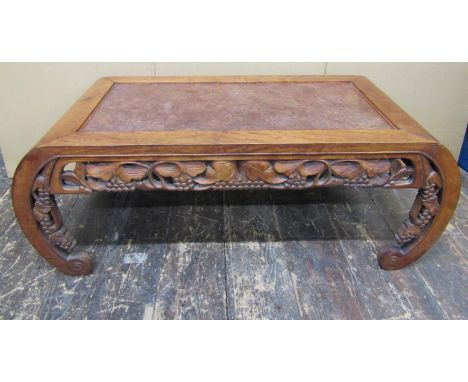 Chinese hardwood occasional table, raised on four scrolled supports, pierced frieze with fruiting vine detail, the central in