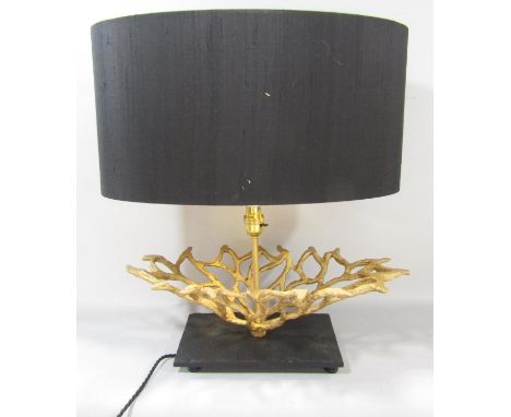 An unusual designed table lamp of a coral like form set on a black slate base, with an integral dimmer switch and black silk 