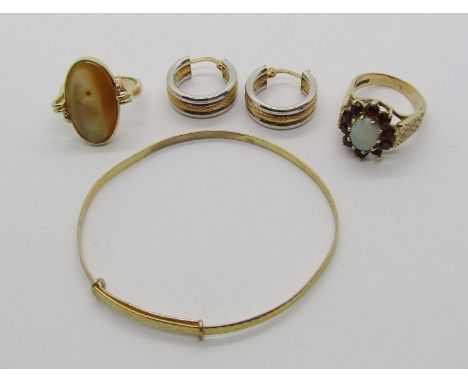 Group of gold jewellery; 9ct opal and garnet cluster ring, further 9ct dress ring and 9ct christening bangle, 9.7g total and 