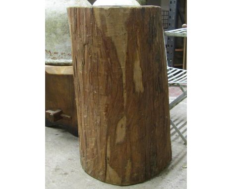 A rustic hollowed out tree trunk planter  with chip carved interior, 88 cm high x 60 cm width at widest point 