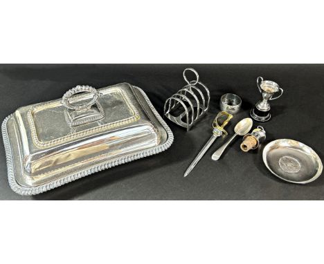 A silver plated tureen with cover, a toast rack , a bottle stop/pourer, a small trophy, a dish with a Victorian coin, etc 