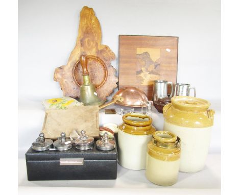 A faux black snakeskin clad jewellery box, with keys, a brass hand bell and a stoneware jar with lid, a large copper ladle, a