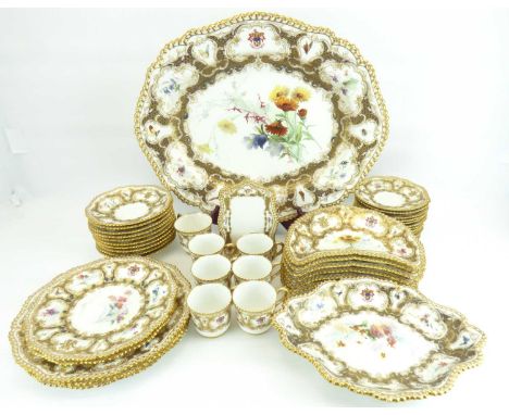 ROYAL WORCESTER; an approximately ninety-six piece dinner service, each item with a hand painted central floral decoration, w