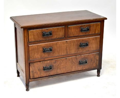 An early 20th century walnut chest of two short over two long drawers, raised on turned supports, formerly a dressing chest, 