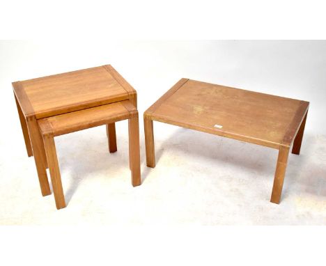 A nest of three light oak tables, the largest 36 x 80 x 54cm.36 x 80 x 54cm