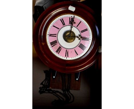 A late 19th/early 20th century mahogany postman's alarm wall clock, the pink and white enamel dial set with Roman numerals, d