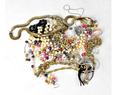 A quantity of costume jewellery to include faux pearl necklaces, charm bracelets, etc